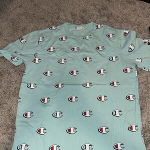 Champion Tee